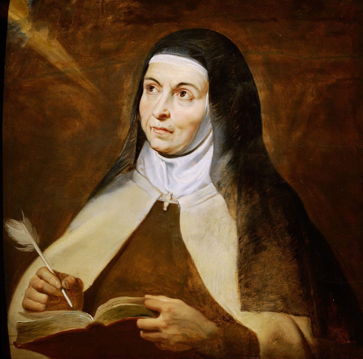 Peter Paul Rubens's portrait of St. Teresa of Ávila in the brown habit and black and white veil of a Carmelite, holding a quill over an open book, her eyes lifted in inspiration